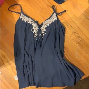 Blue tank top | white design on neck line